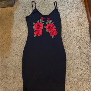 Black dress with red roses
